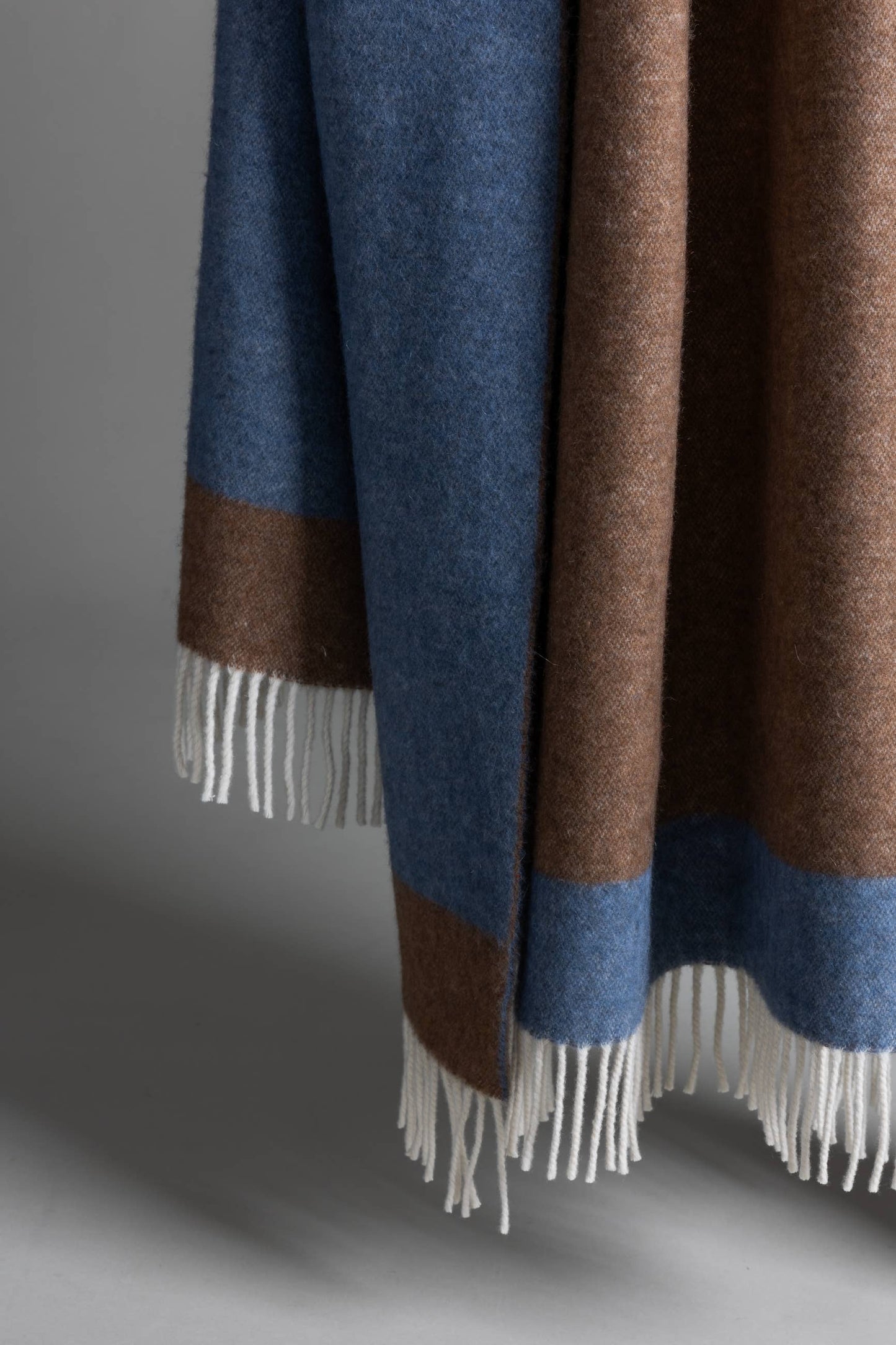 
                  
                    TEOREMA Throw Blanket- Blue/Brown
                  
                