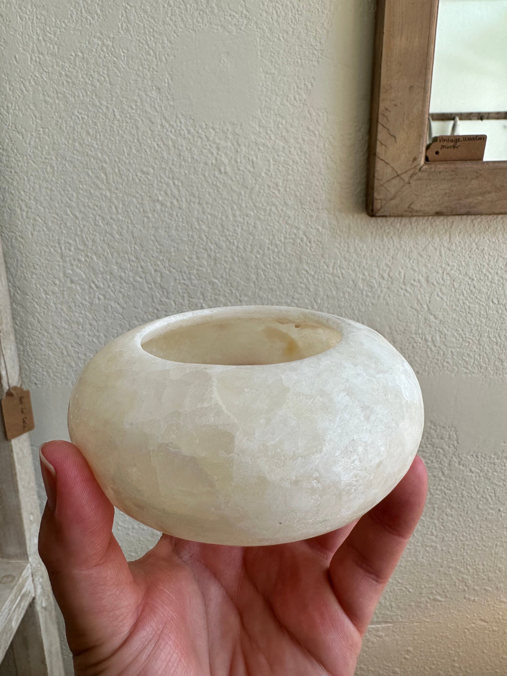 Disc Shaped Votive held in someones hand