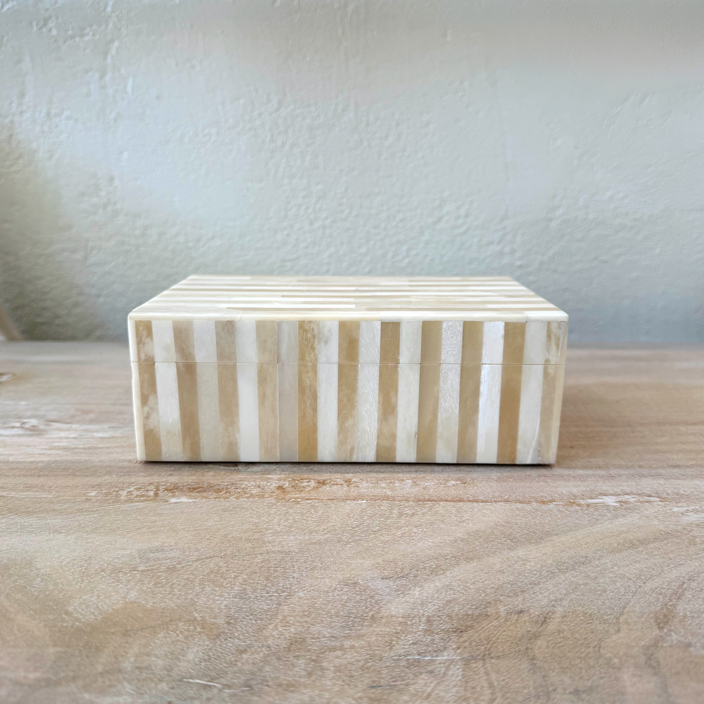 Bone inlay box on a bookshelf
