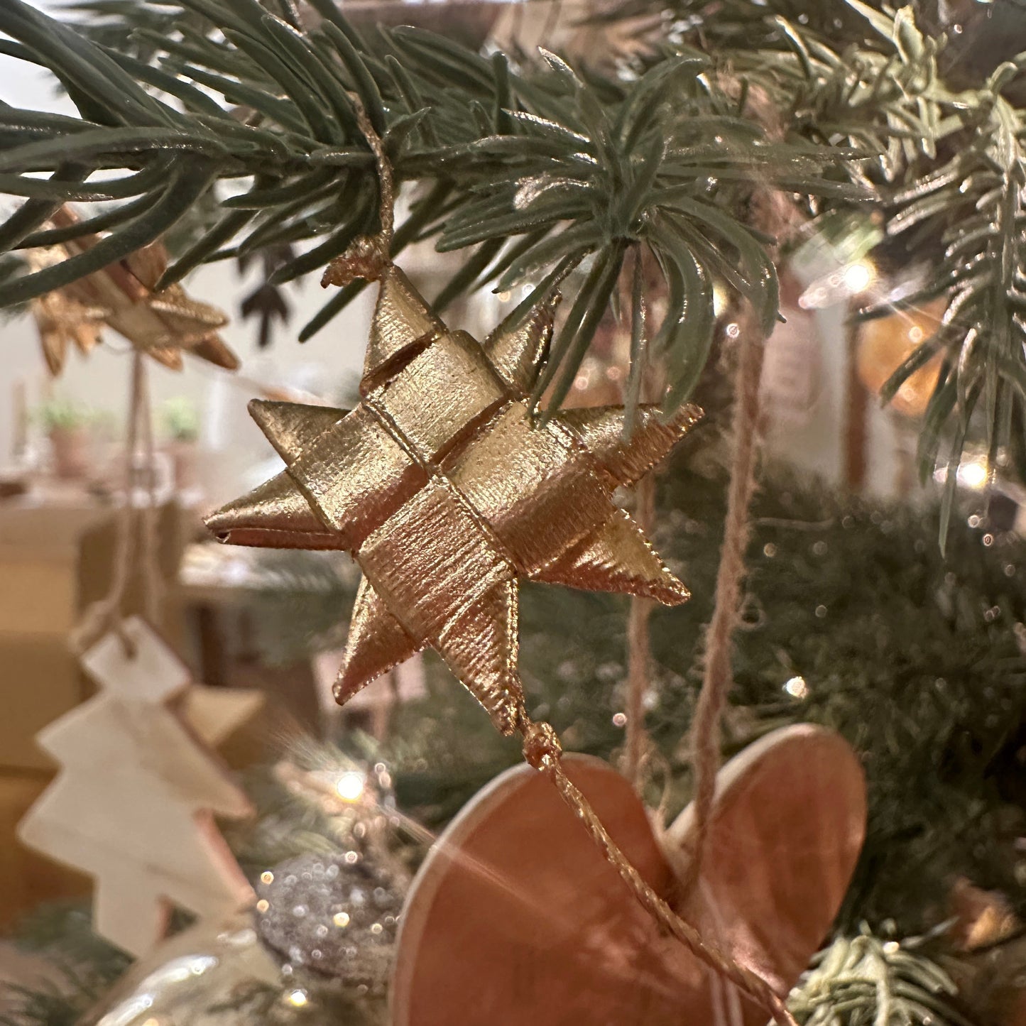 Star Garland Hanging in Christmas Tree