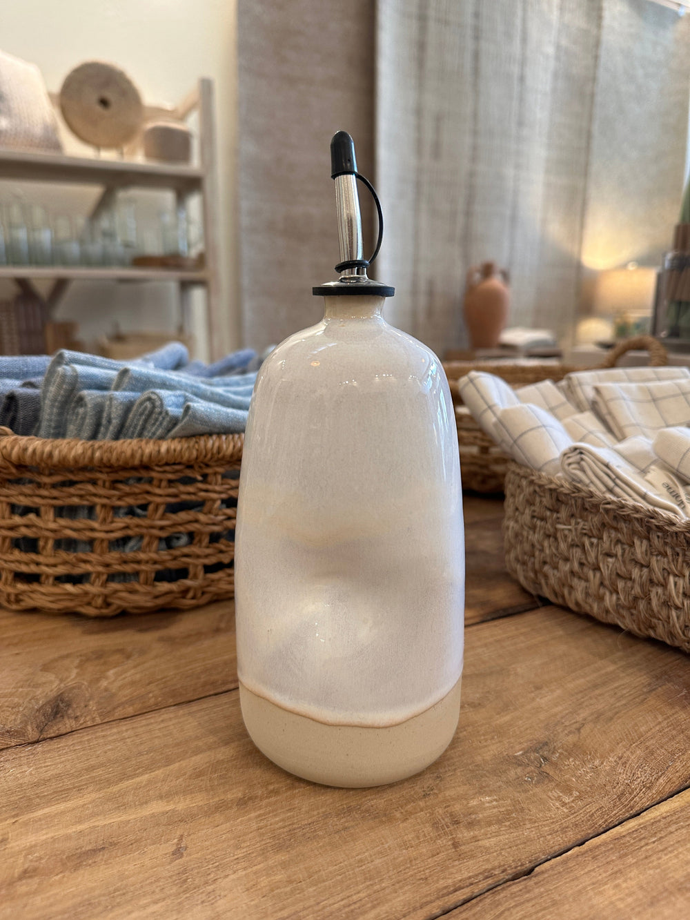 olive oil dispenser displayed showing a pinch point