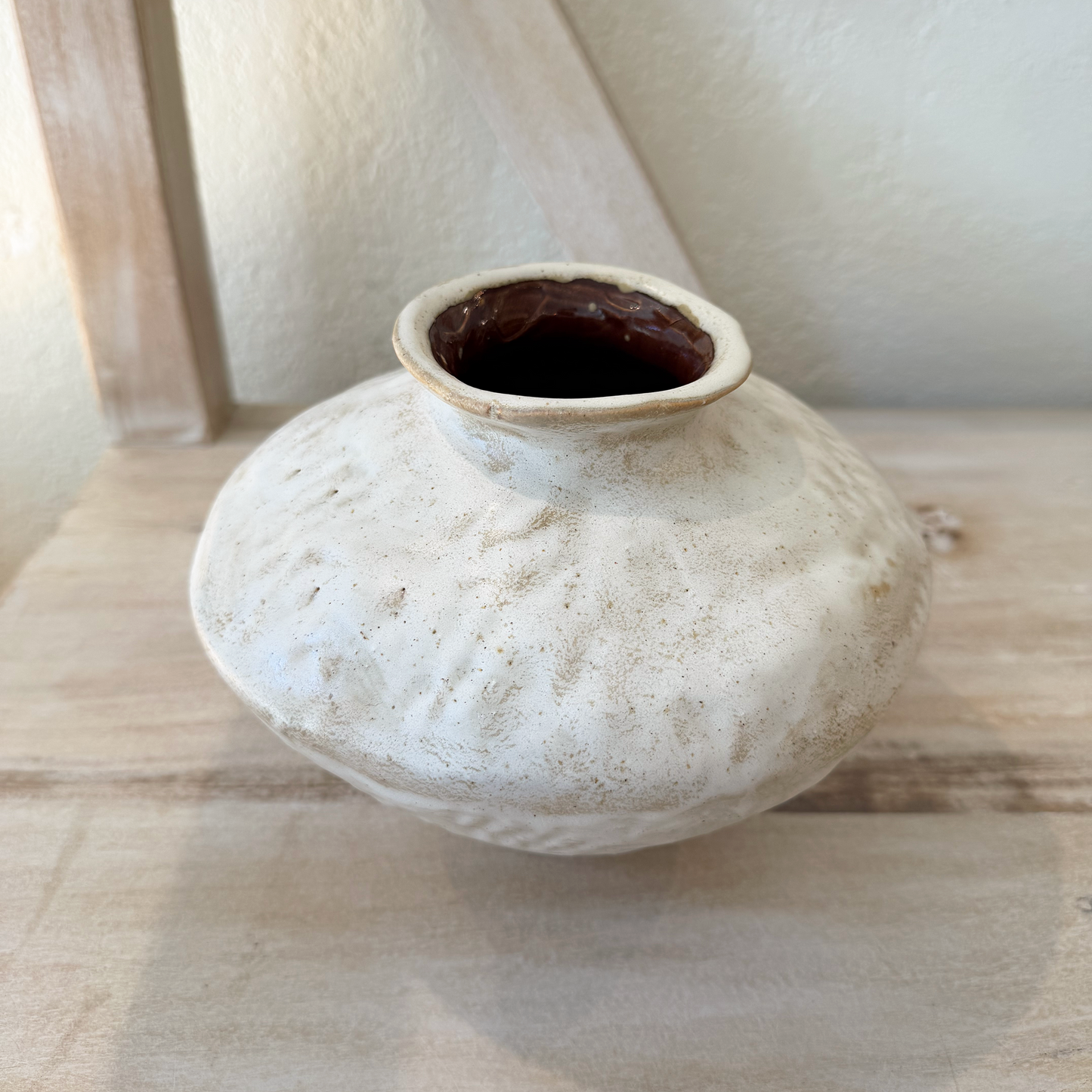 Wabi Sabi Vase on a display self