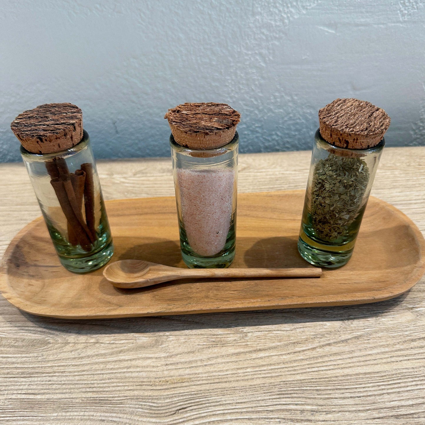 
                  
                    Oval Wood Tray with Spice Jars and Spoon.
                  
                