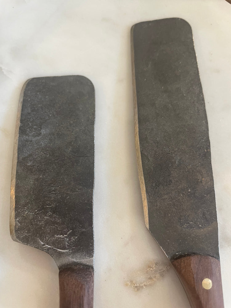 
                  
                    Detail of cheese knife blade showing hand made markings
                  
                