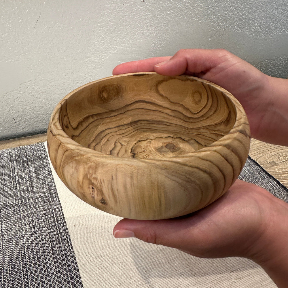 Teak Bowl in hands.