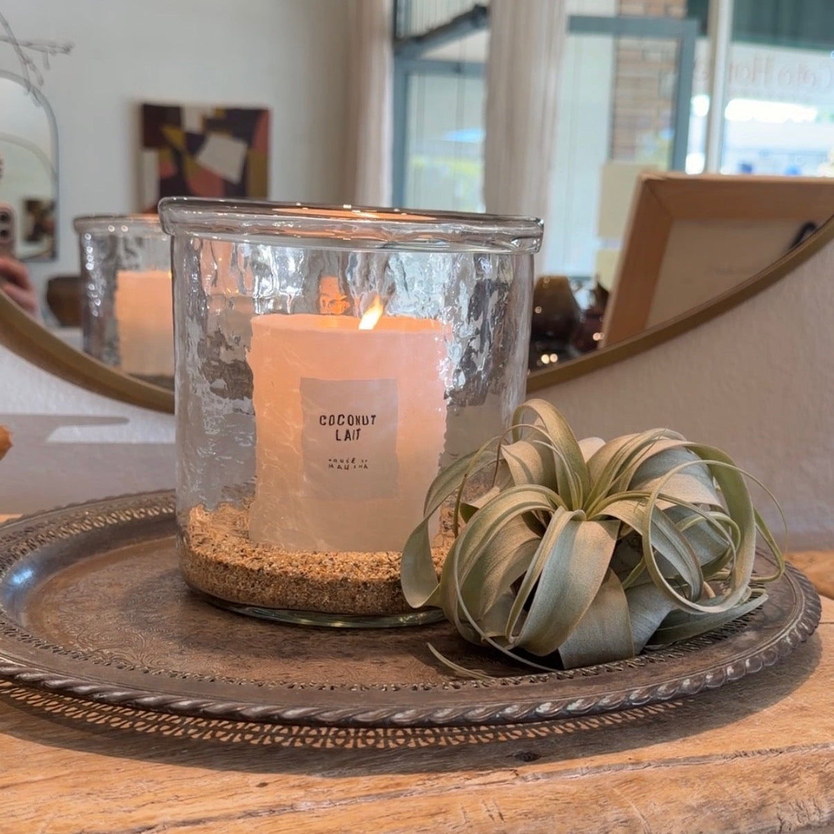 Candle in glass vessel