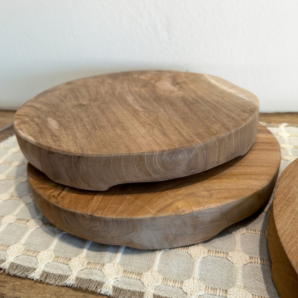
                  
                    Teak Risers Stacked on table
                  
                