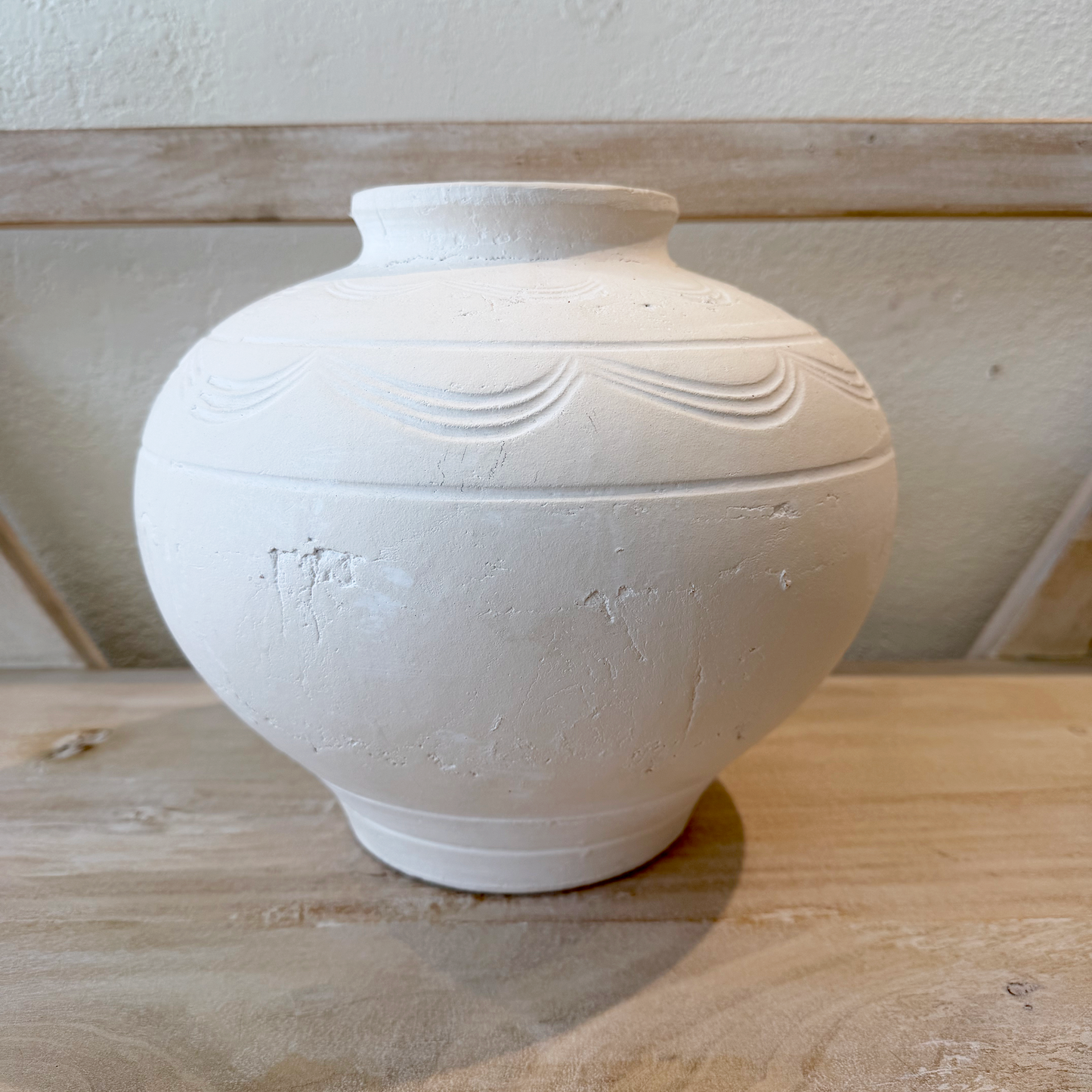 White Vase on a styled on a shelf