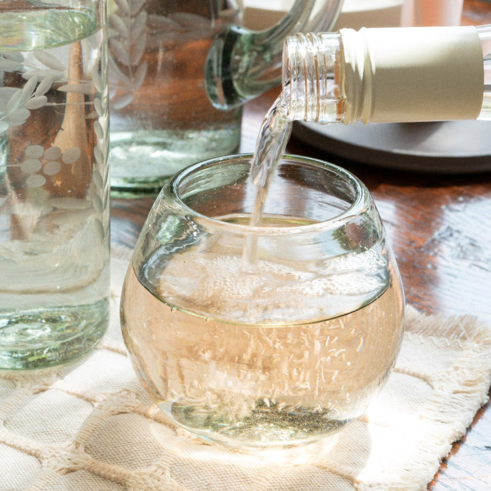 
                  
                    Filling the wine glass with rose
                  
                