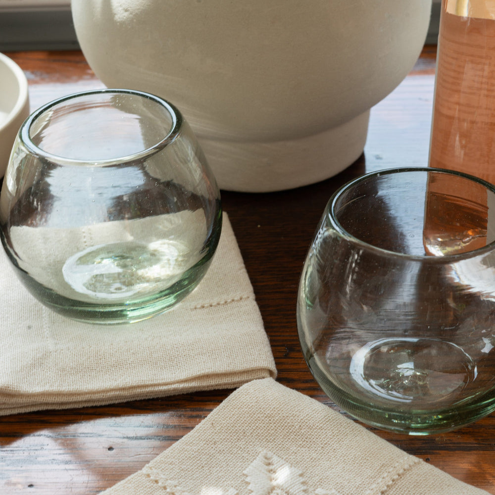 
                  
                    Two wine glasses on a table
                  
                