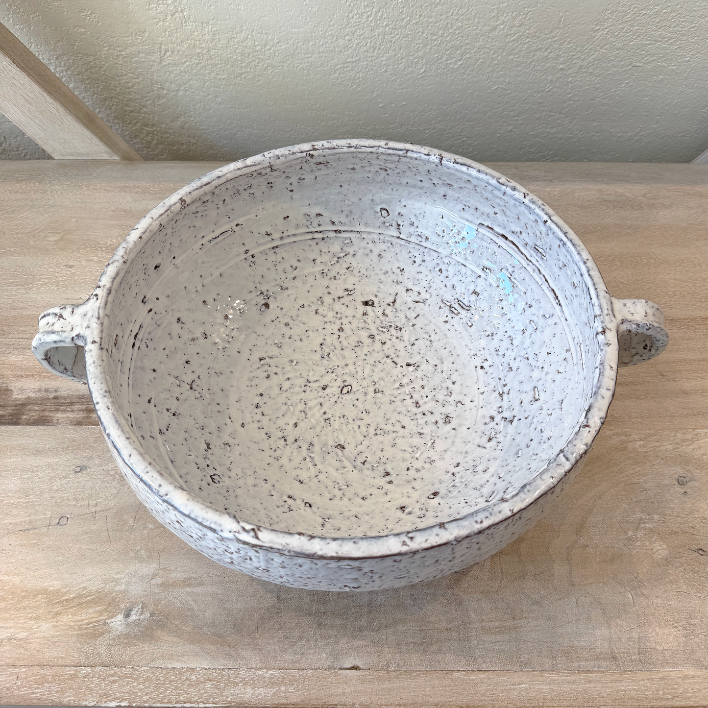 ceramic bowl on a shelf
